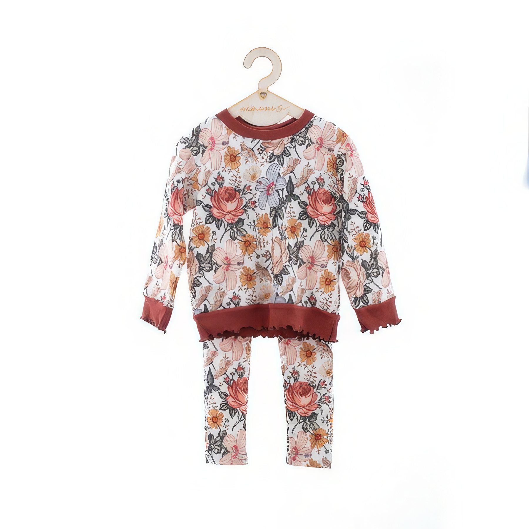 Dziecięcy komplet bluza i legginsy w kwiatowy wzór, na wieszaku, packshot na białym tle